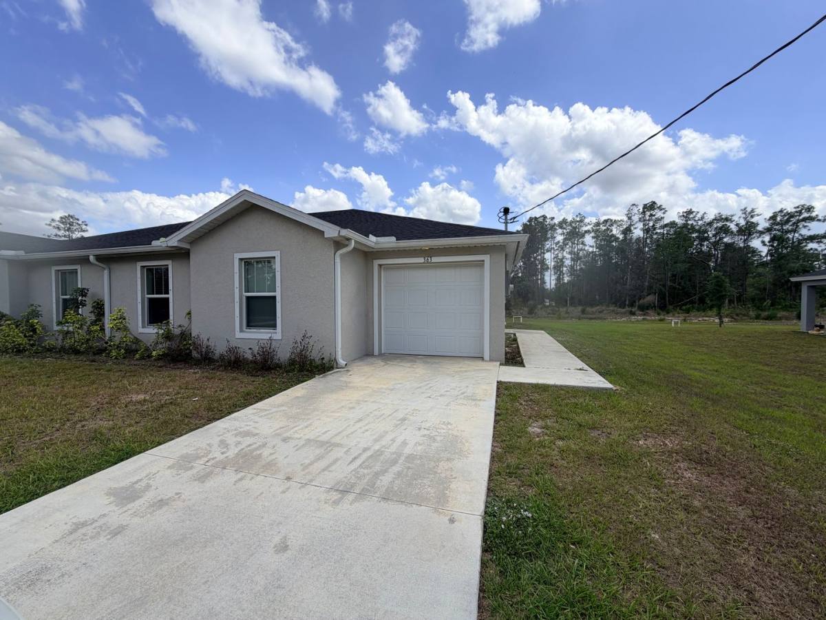 Townhouse for rent at 363 Greenbriar Blvd, Lehigh Acres, FL 33972
