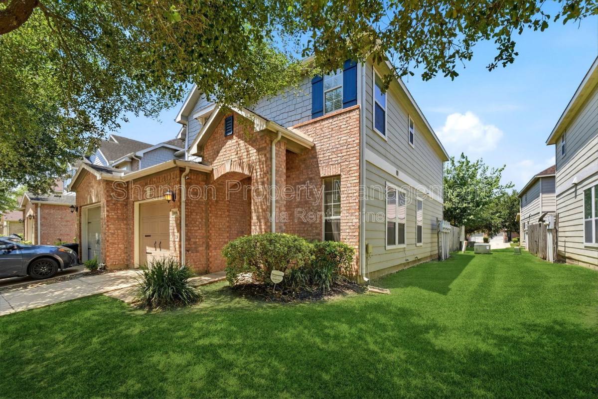 Townhouse for rent at 8010 Singing Sonnet Lane, Houston, TX 77072