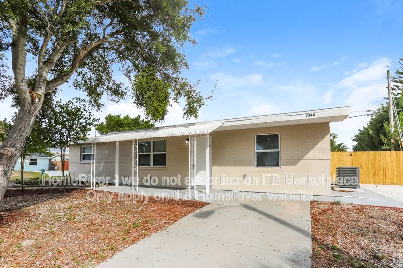 House for rent at 1048 Powersong St, Holiday, FL 34690
