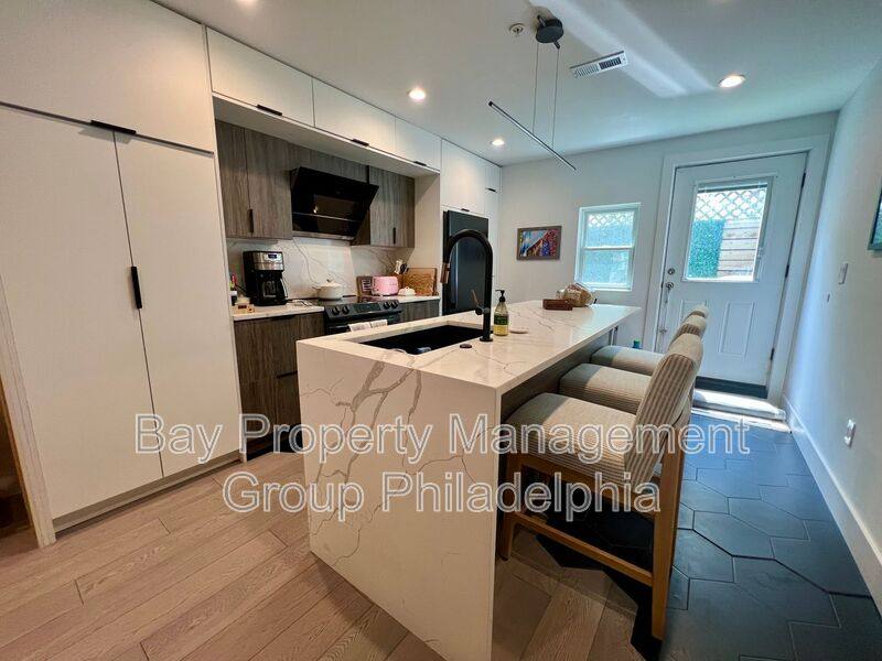 Townhouse for rent at 166 W Laurel St, Philadelphia, PA 19123