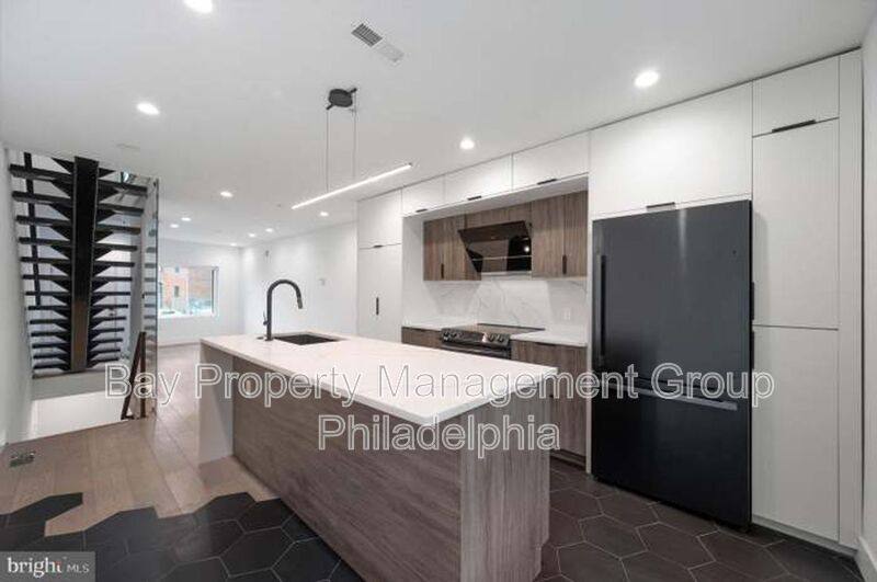 Townhouse for rent at 166 W Laurel St, Philadelphia, PA 19123