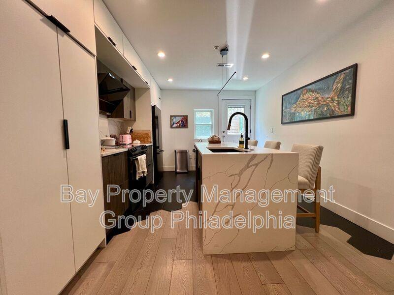 Townhouse for rent at 166 W Laurel St, Philadelphia, PA 19123
