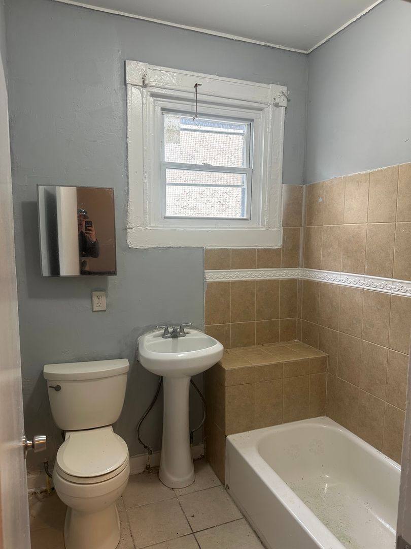 House for rent at 1406 Poplar Grove St, Baltimore, MD 21216