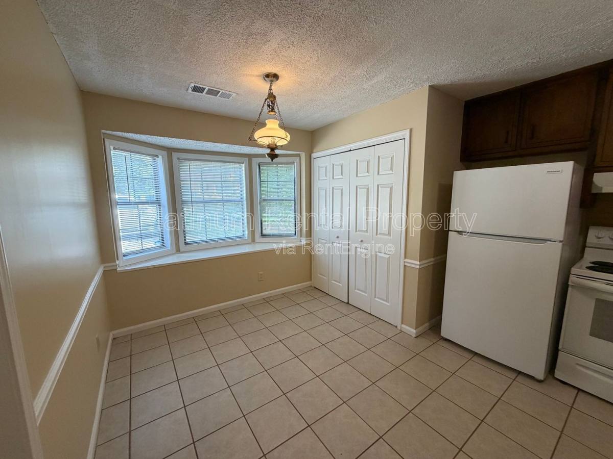 Townhouse for rent at 1955 Patterson Court, Lawrenceville, GA 30044