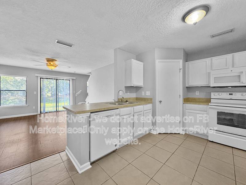 Townhouse for rent at 7851 Playschool Lane, Jacksonville, FL 32210