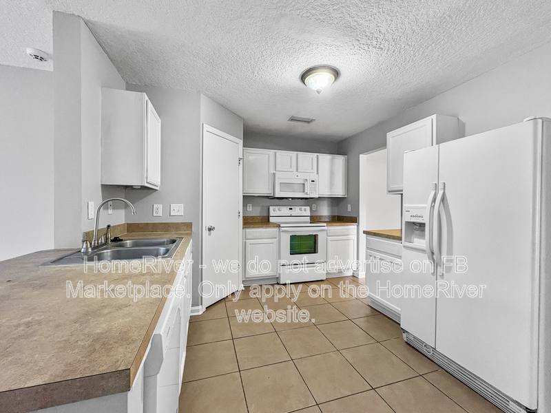 Townhouse for rent at 7851 Playschool Lane, Jacksonville, FL 32210