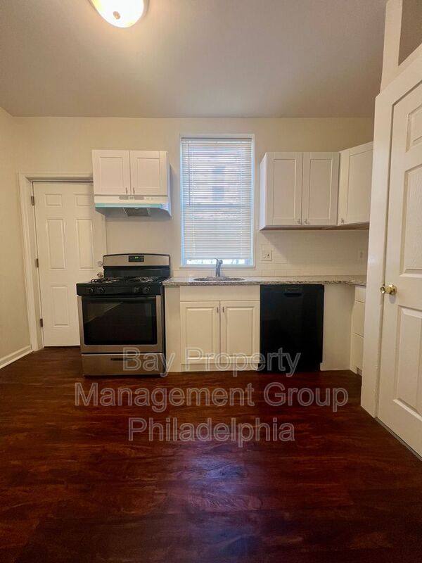 Townhouse for rent at 2165 W Grange Ave, Philadelphia, PA 19138