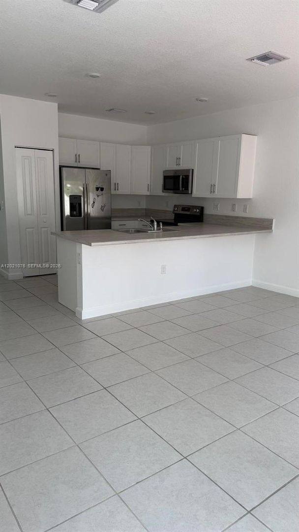 Townhouse for rent at 3440 W 111th Place, Hialeah, FL 33018