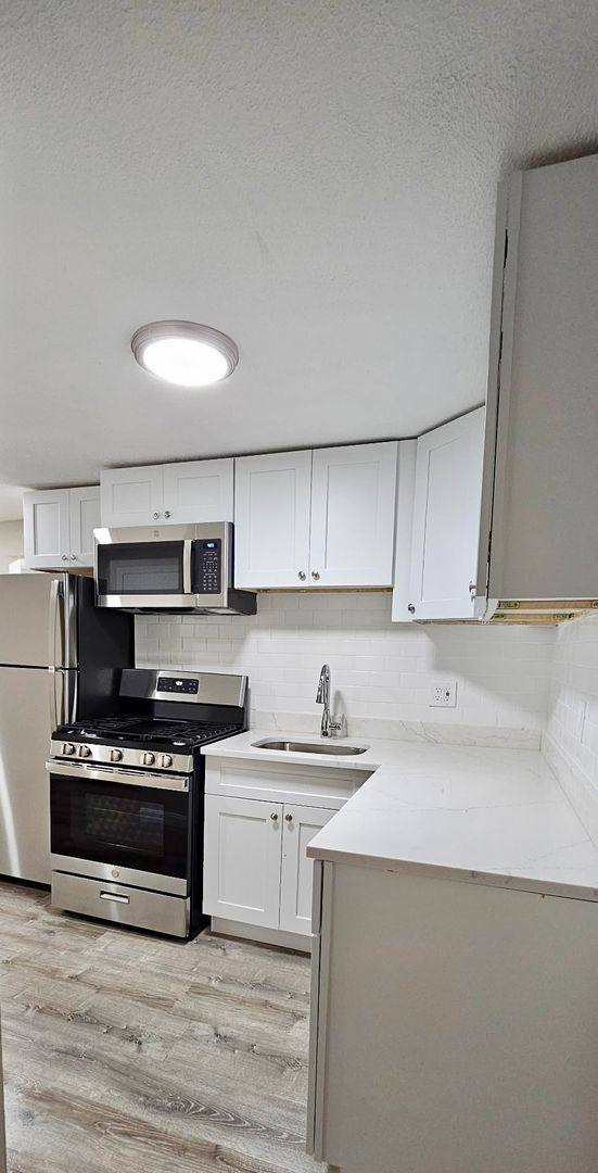 Apartment for rent at 77 Bernier St, Lowell, MA 01852