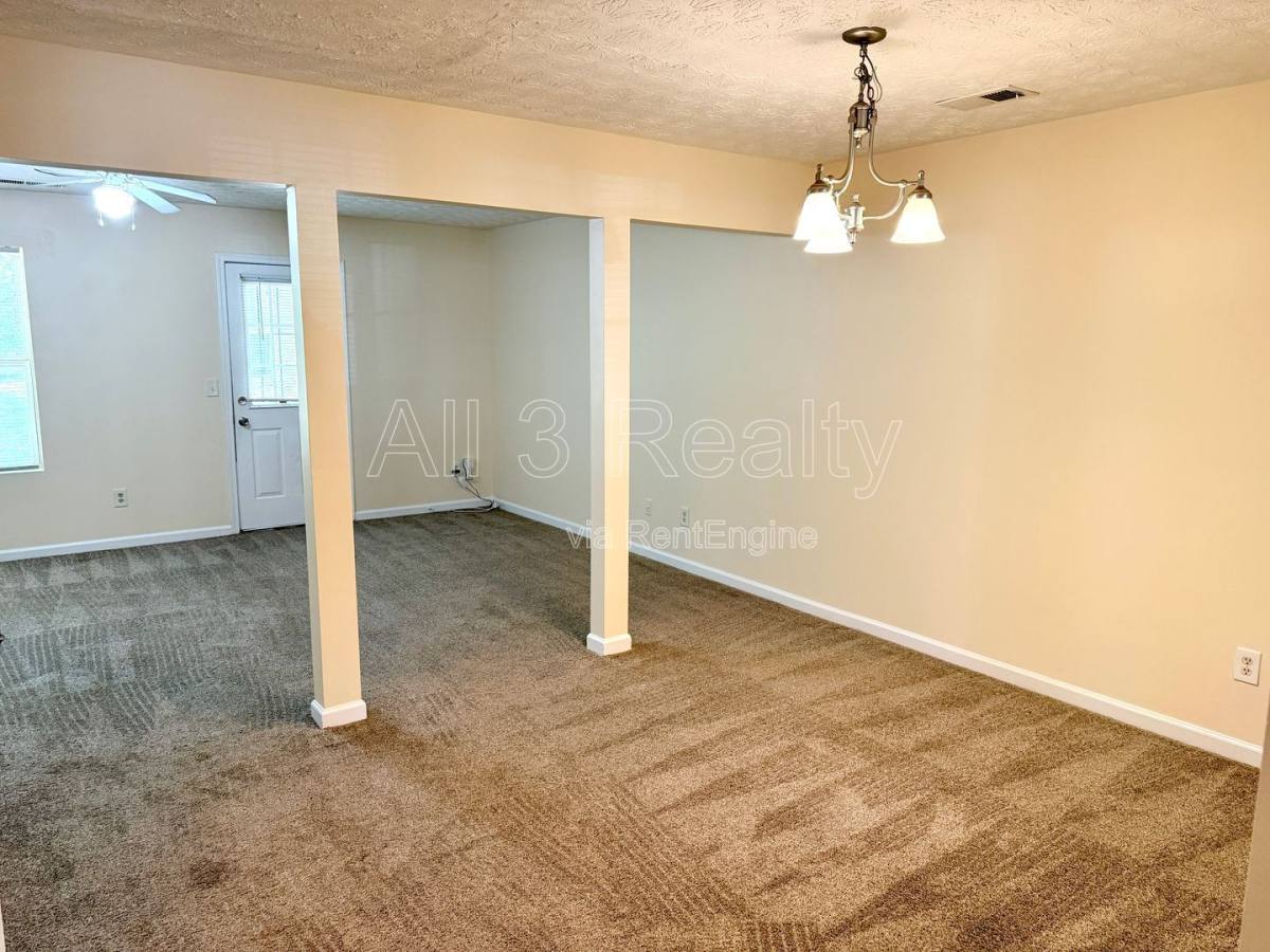 Townhouse for rent at 1863 Grove Way, Hampton, GA 30228