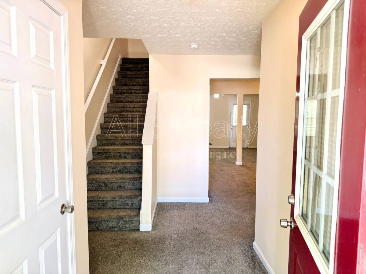 Townhouse for rent at 1863 Grove Way, Hampton, GA 30228