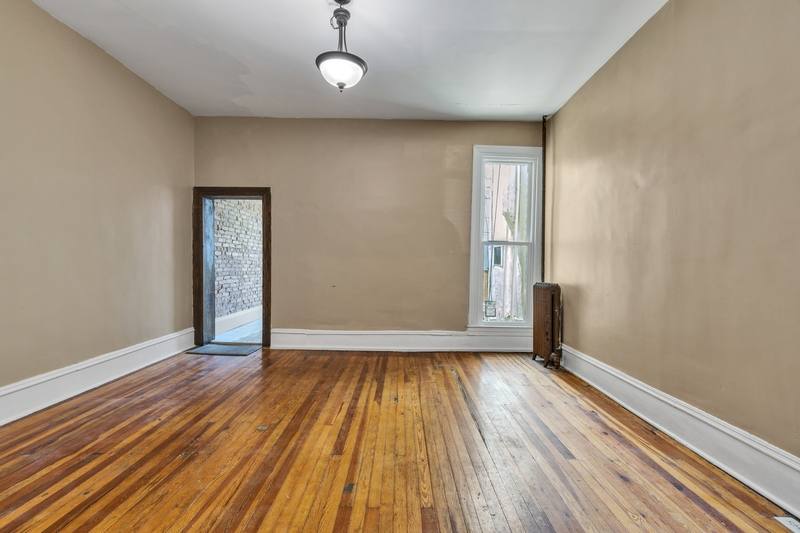 Townhouse for rent at 313 E 25th St, Baltimore, MD 21218