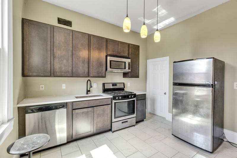 Townhouse for rent at 313 E 25th St, Baltimore, MD 21218
