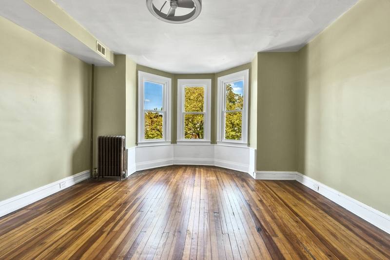 Townhouse for rent at 313 E 25th St, Baltimore, MD 21218
