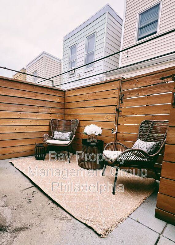 Townhouse for rent at 129 Emily St, Philadelphia, PA 19148
