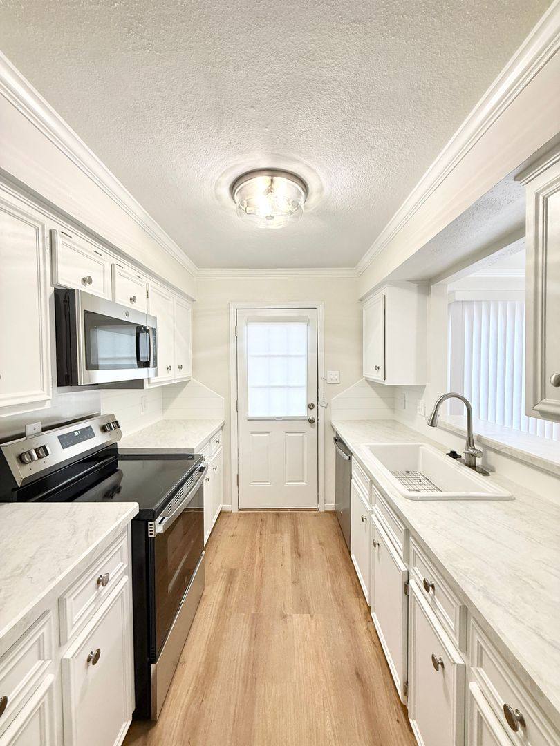 Townhouse for rent at 1477-1497 Springrock Lane, Houston, TX 77055