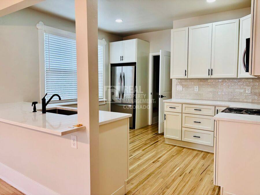 Townhouse for rent at 1415 N Raleigh St #A, Denver, CO 80204