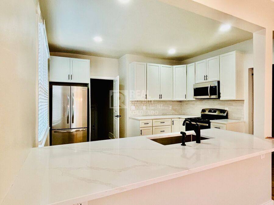 Townhouse for rent at 1415 N Raleigh St #A, Denver, CO 80204