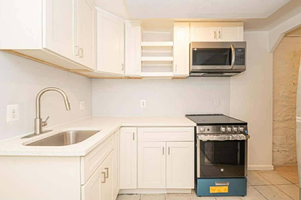 Apartment for rent at 307 E 25th St #BSMT, Baltimore, MD 21218