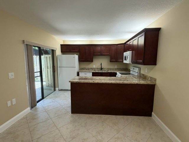 Townhouse for rent at 2407 24th Lane, Palm Beach Gardens, FL 33418
