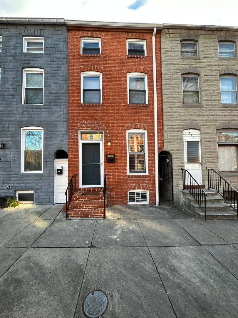 Townhouse for rent at 305 S Ann St, Baltimore, MD 21231
