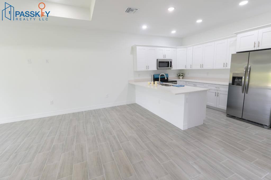 Townhouse for rent at 871 Duplex St E, Lehigh Acres, FL 33974