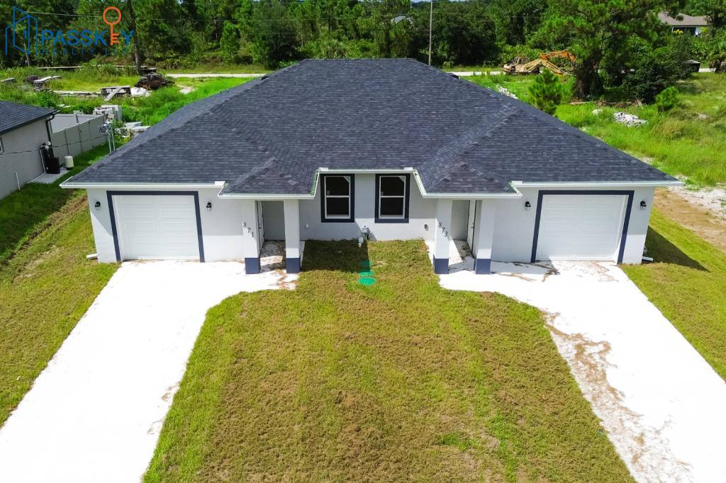 Townhouse for rent at 871 Duplex St E, Lehigh Acres, FL 33974