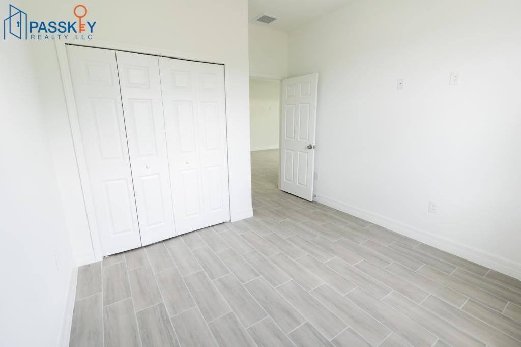 Townhouse for rent at 871 Duplex St E, Lehigh Acres, FL 33974