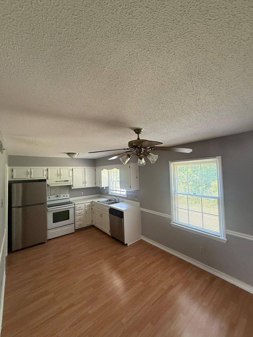 Townhouse for rent at 4704 Lawndale Dr, Greensboro, NC 27455