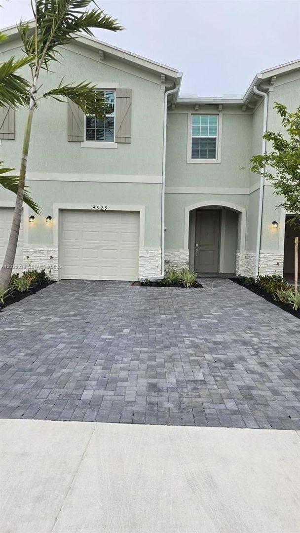 Townhouse for rent at 4329 Pond Lily Lane, Lake Worth, FL 33467