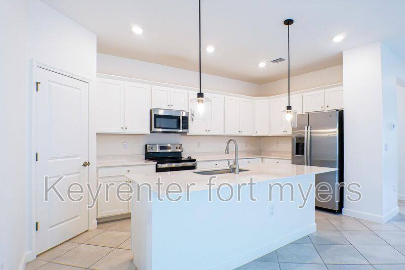 House for rent at 9143 Leatherwood Loop, Lehigh Acres, FL 33936
