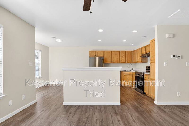 Townhouse for rent at 805 Creek Crossing Trail, Whitsett, NC 27377