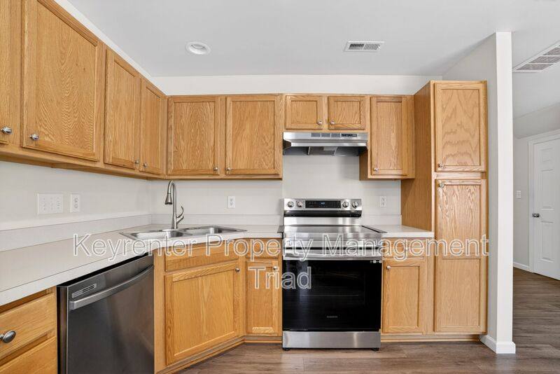 Townhouse for rent at 805 Creek Crossing Trail, Whitsett, NC 27377