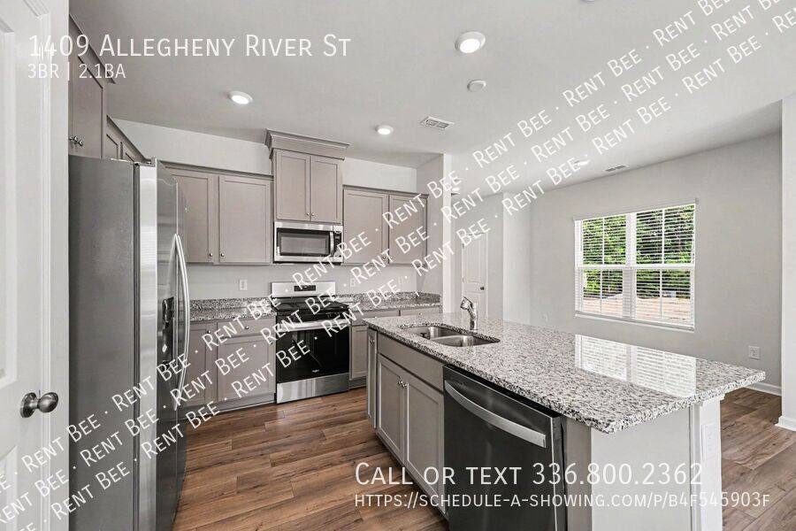 Townhouse for rent at 1409 Allegheny River St, Greensboro, NC 27405