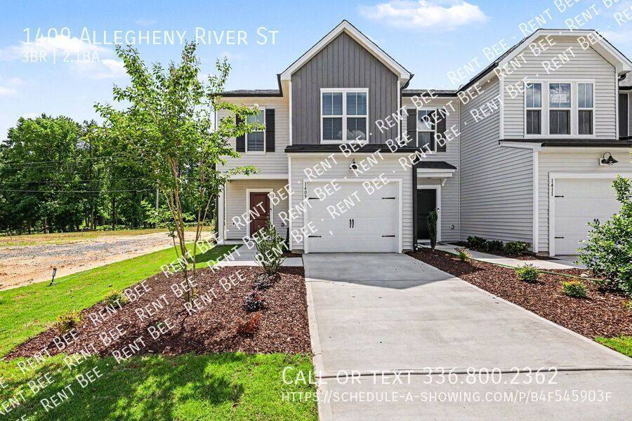 Townhouse for rent at 1409 Allegheny River St, Greensboro, NC 27405