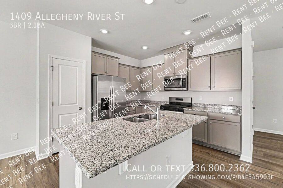 Townhouse for rent at 1409 Allegheny River St, Greensboro, NC 27405