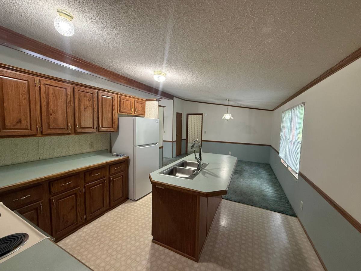 House for rent at 411 W 1st St, Eldon, MO 65026