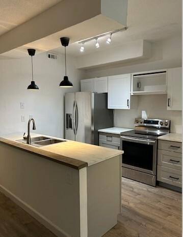 Condo for rent at Holly Ridge Townhomes, 7107 Holly Hill Dr #104-1, Dallas, TX 75231