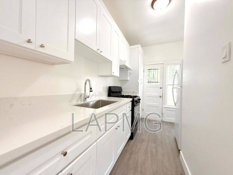 House for rent at 2941-2943 1 2 W 11th St, Los Angeles, CA 90006