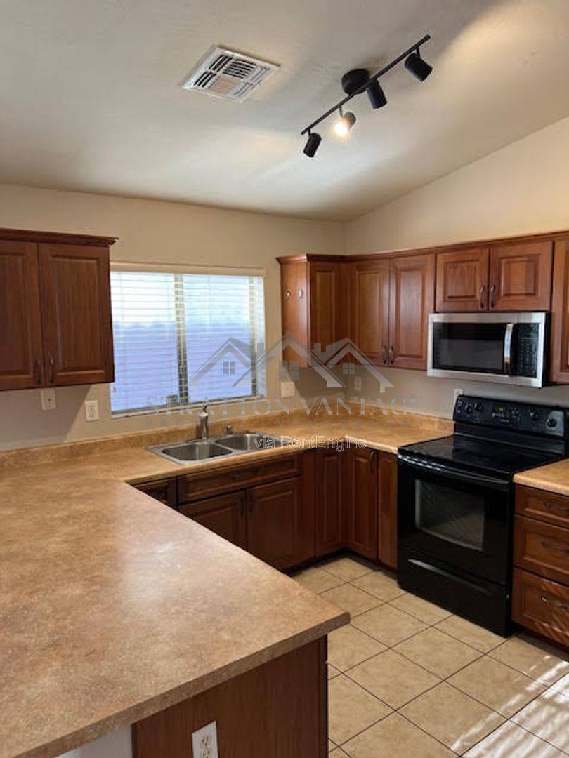 House for rent at 11429 W Austin Thomas Dr, Surprise, AZ 85378