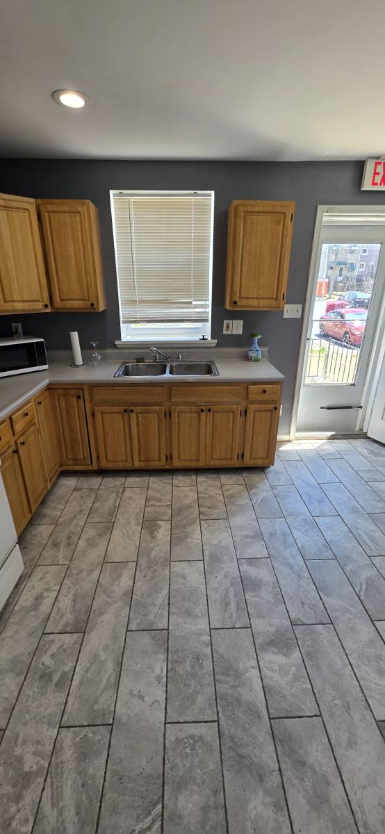 Townhouse for rent at 2133 W Mulberry St, Baltimore, MD 21223