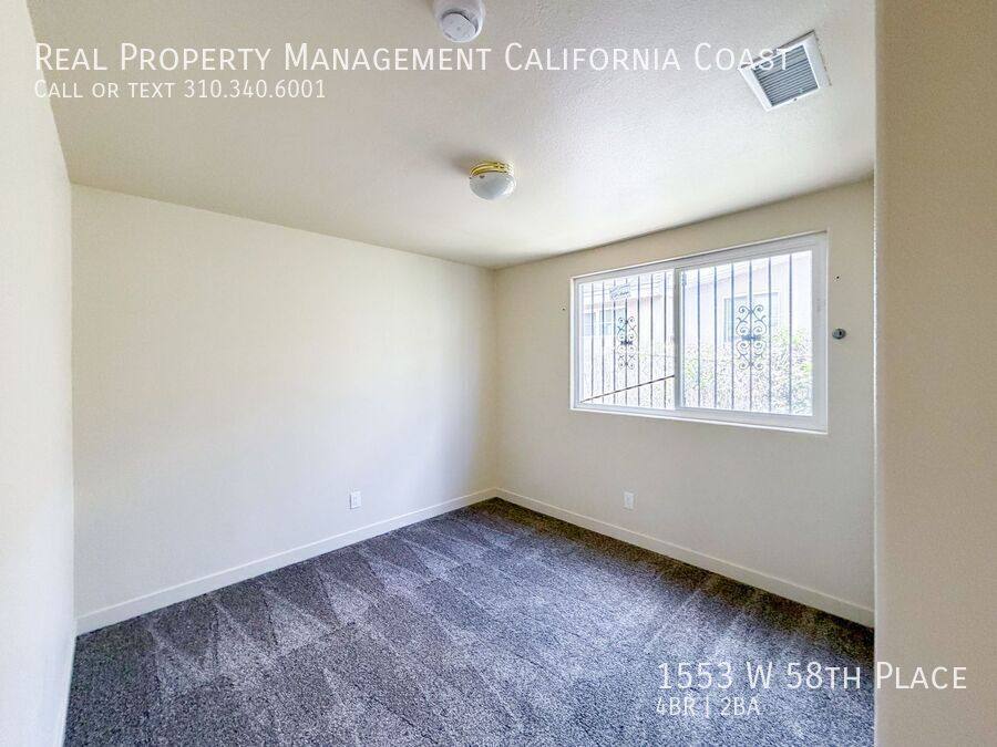 House for rent at 1553 W 58th Place, Los Angeles, CA 90047