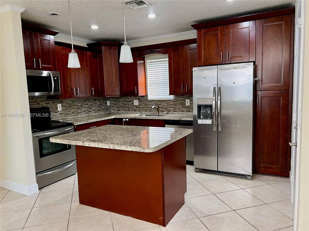Townhouse for rent at 10560 NW 57th Court, Pompano Beach, FL 33076