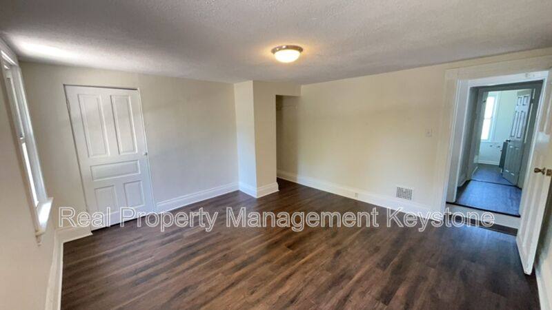 Apartment for rent at 1405-1407 W St, Homestead, PA 15120