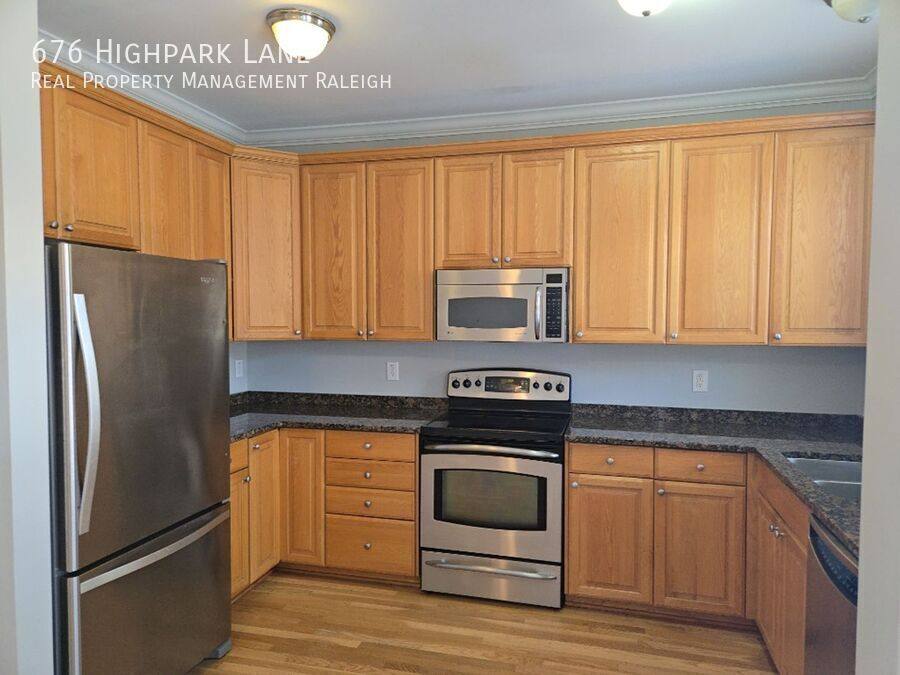 Townhouse for rent at 676 Highpark Lane, Raleigh, NC 27608