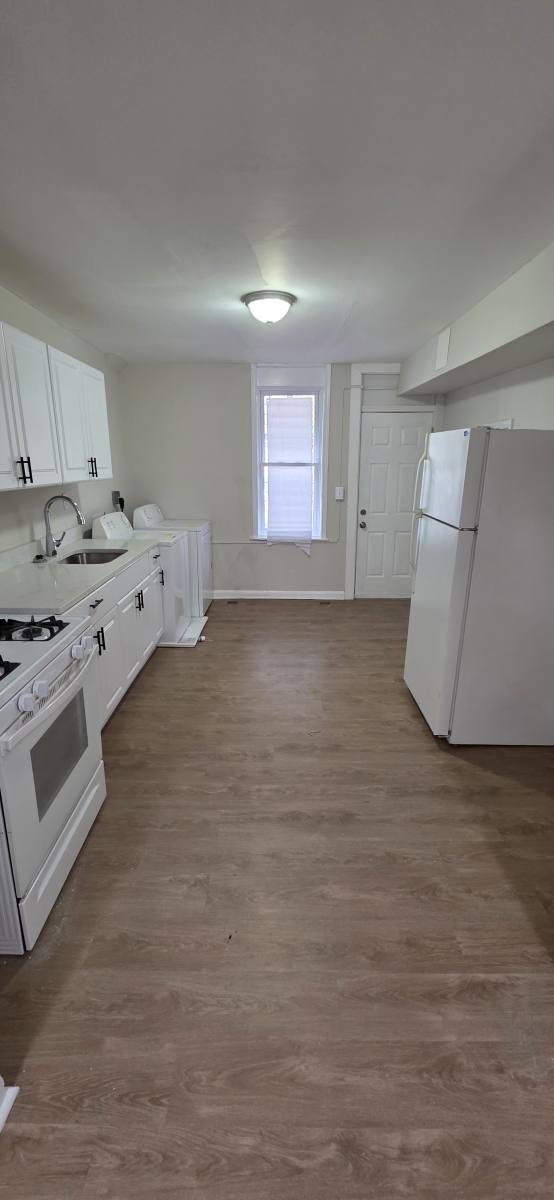 Townhouse for rent at 305 S Calhoun St, Baltimore, MD 21223