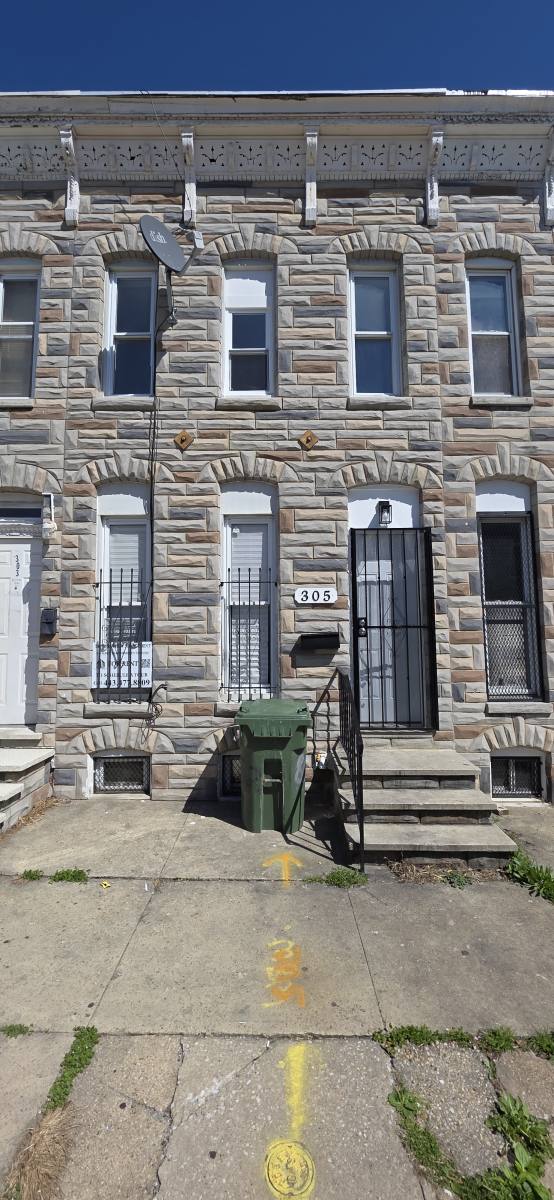 Townhouse for rent at 305 S Calhoun St, Baltimore, MD 21223