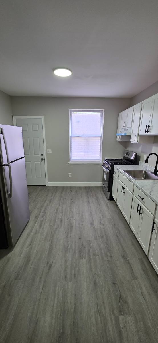 Townhouse for rent at 707 N Port St, Baltimore, MD 21205
