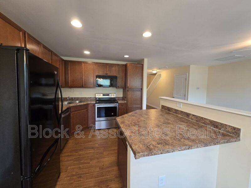 Townhouse for rent at 545 Song Sparrow Lane, Greensboro, NC 27409