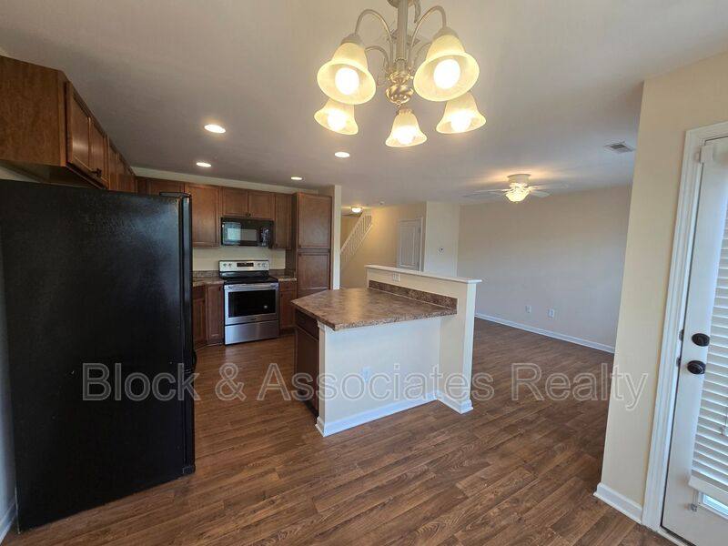 Townhouse for rent at 545 Song Sparrow Lane, Greensboro, NC 27409
